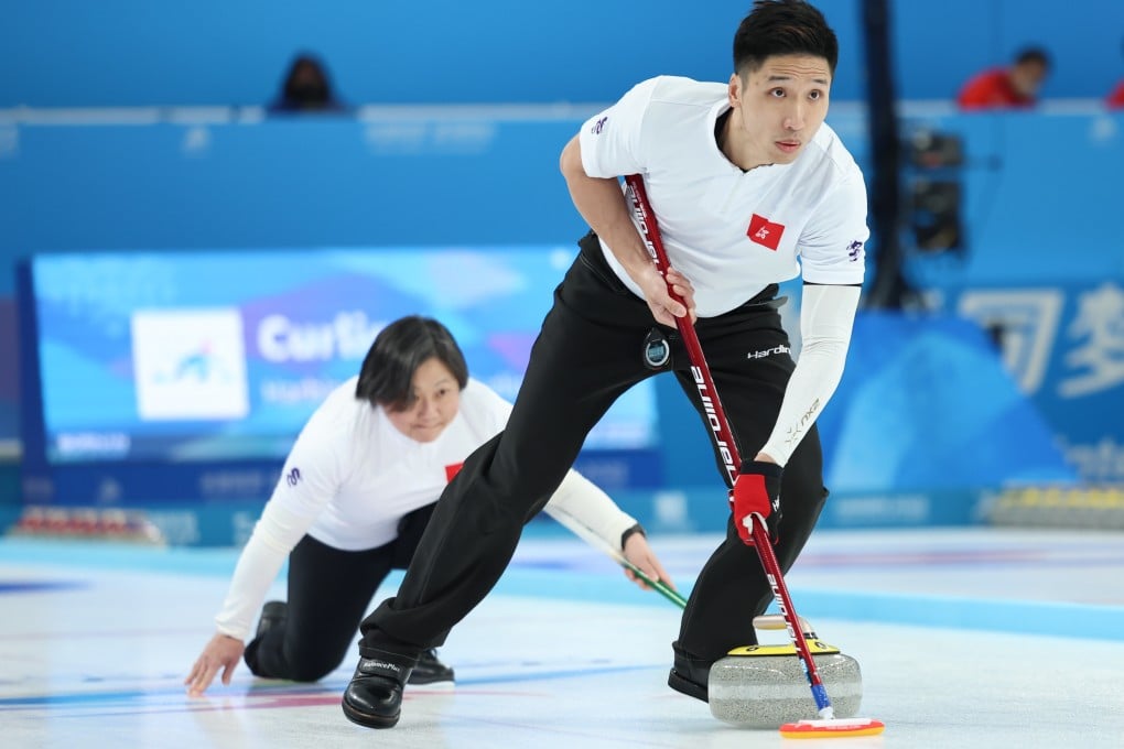 Hong Kong’s curling pair of Martin Yan (right) and Hung Ling-Yue beat Thailand’s Chanatip Sonkham and Teekawin Jearateerawit in Harbin on Thursday. Photo: Xinhua