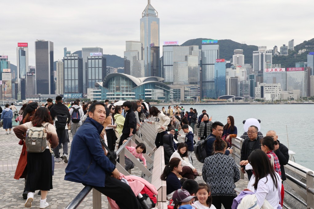 Tourists visit the Tsim Sha Tsui waterfront during Lunar New Year. Photo: Jelly Tse