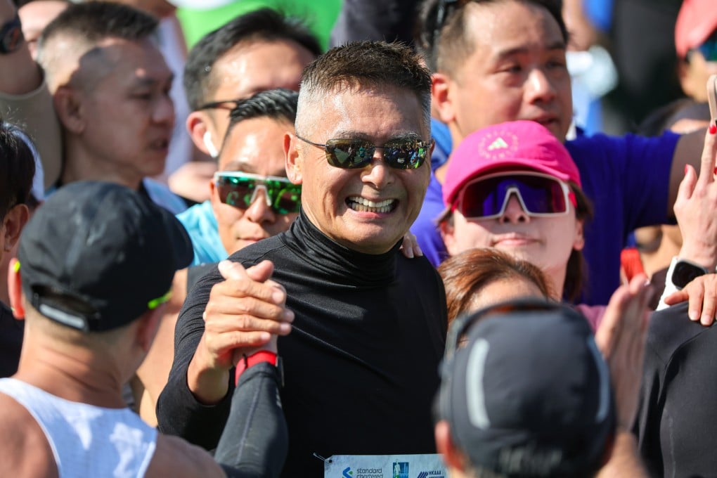 Chow Yun-fat at the Standard Chartered Hong Kong Marathon finish line. Photo: Edmond So