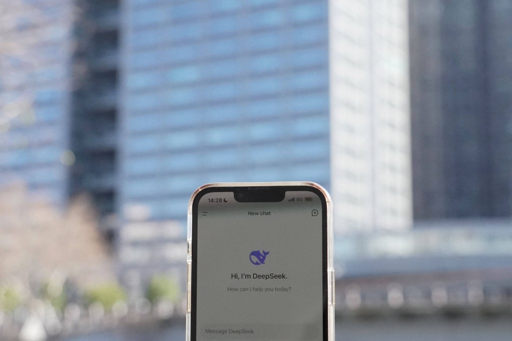 The DeepSeek app on a smartphone, seen in front of the building housing the headquarters of Chinese AI startup DeepSeek in Hangzhou. Photo: AFP