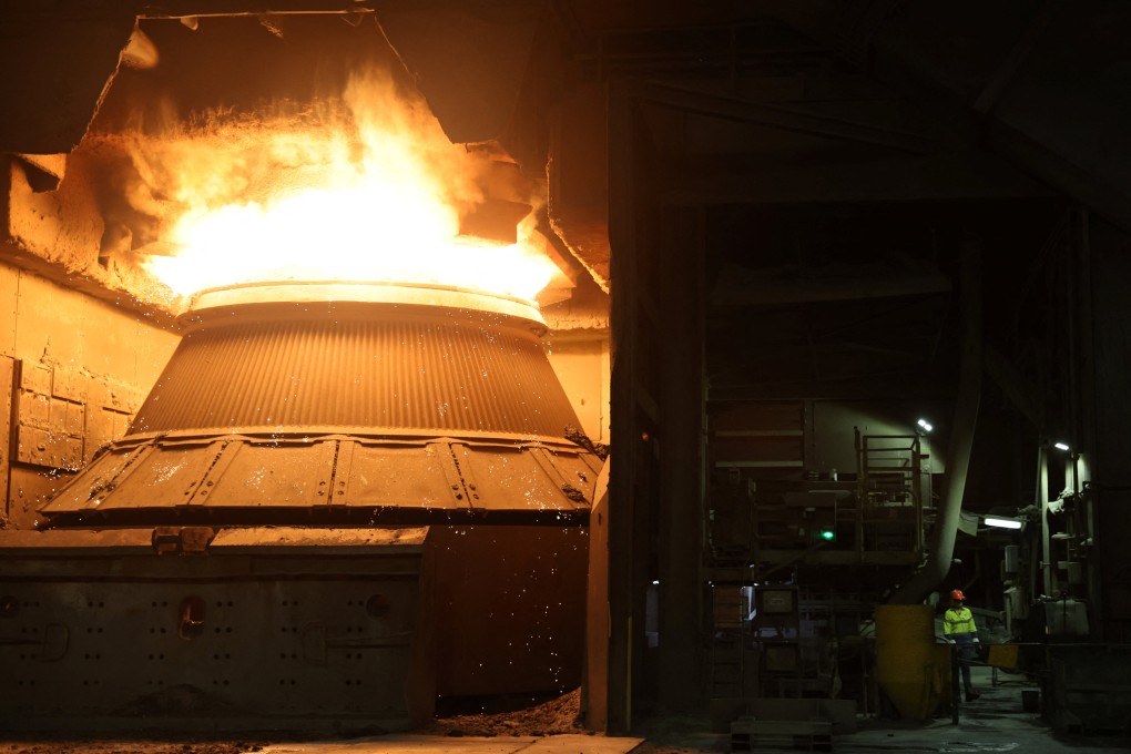 A worker stands next to a furnace at the BlueScope steelworks in Port Kembla, Australia, last year. Photo: Reuters