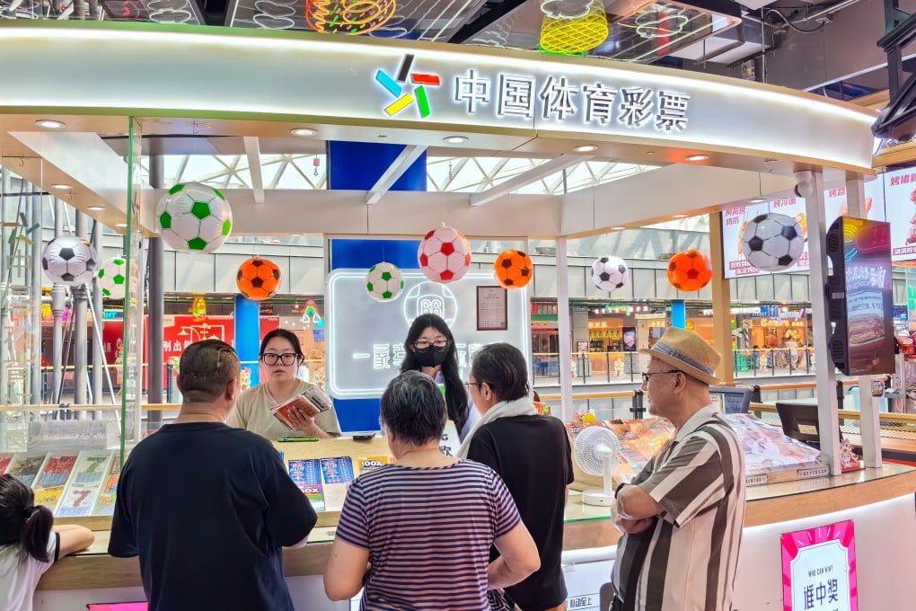 People play the lottery in Beijing last June. China’s annual lottery sales reached an all-time high in 2024. Photo: Simon Song