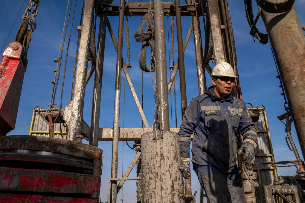 An oil and gas worker operates a drilling rig in Kazakhstan’s Zhetybay field. Kazakhstan is one of China’s main suppliers of natural gas. Photo: Reuters