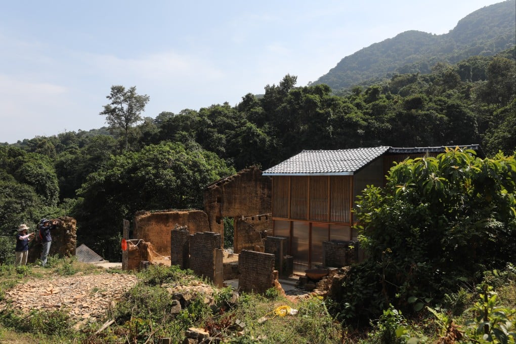 Visitors take photographs in the village of Mui Tsz Lam, an ancient Hakka village nestled in the mountains south of Lai Chi Wo in the North District, in October 2022. Photo: Xiaomei Chen