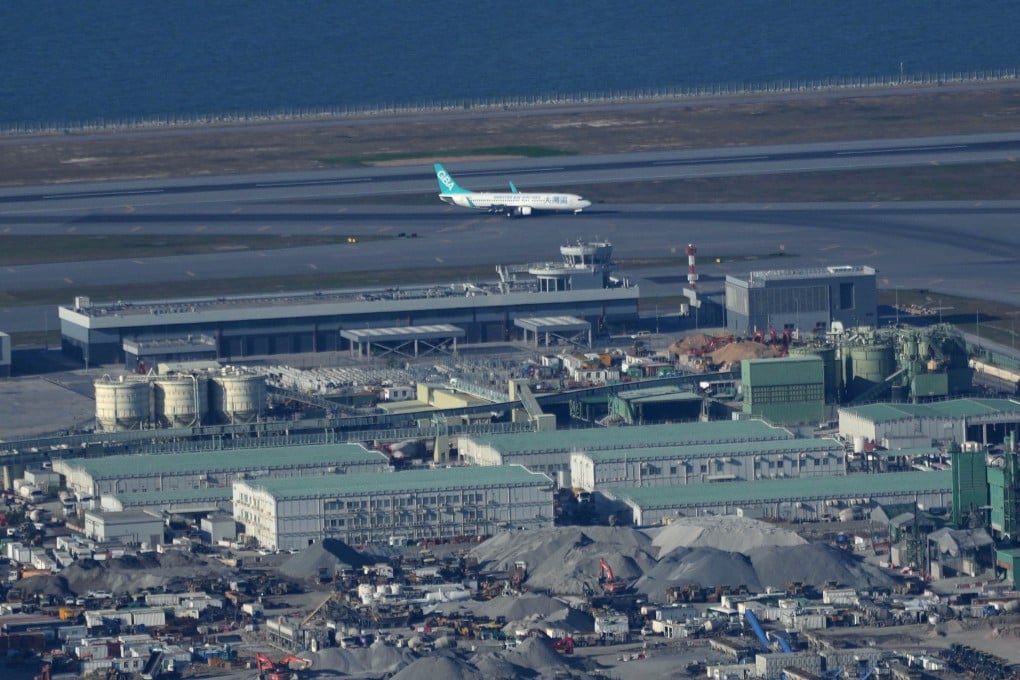 A plane lands on the third runway at Hong Kong International Airport on November 28, 2024. The Airport Authority’s HK$100 billion Skytopia project aims to transform the airport into an airport city rivalling the best in the world. Photo: Elson Li