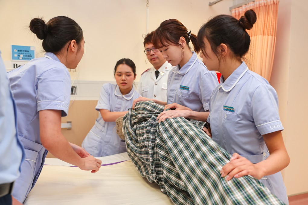 Trainees perform a demonstration for a nursing course at Queen Elizabeth Hospital. Photo: Edmond So