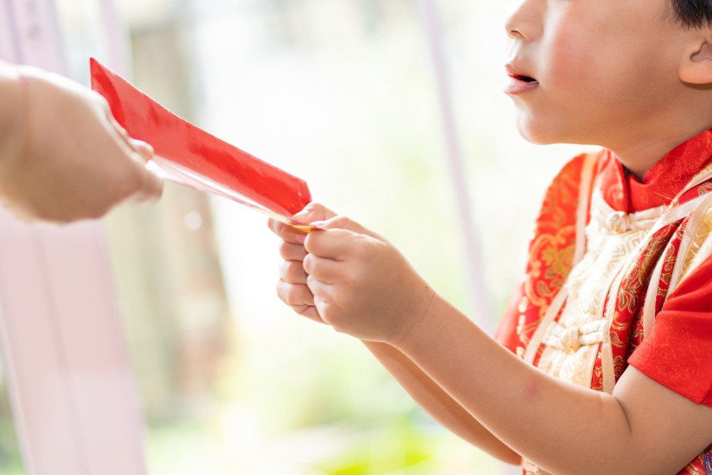 A young boy in China called the police to report a robbery after his father kept his Lunar New Year lucky money. Photo: Shutterstock