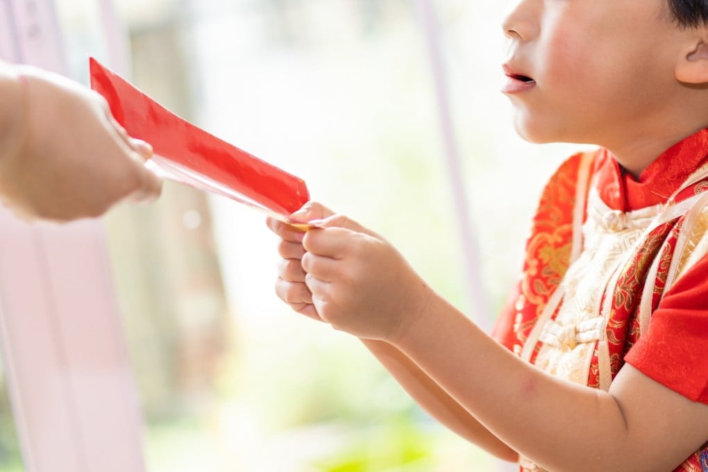 A young boy in China called the police to report a robbery after his father kept his Lunar New Year lucky money. Photo: Shutterstock