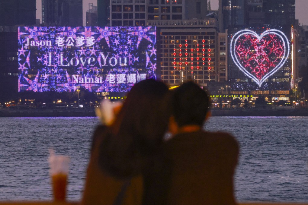 Love messages are displayed on an electronic billboard in Tsim Sha Tsui on February 14, 2024. In cities like Hong Kong, those three little words are seldom spoken in Chinese. Photo: May Tse