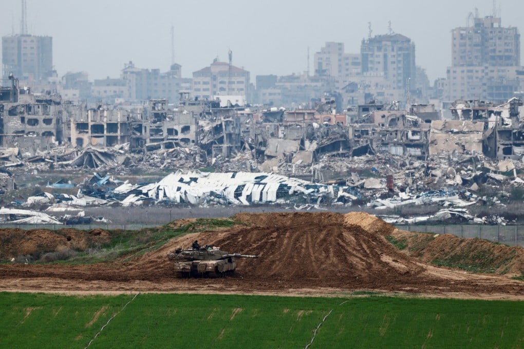 An Israeli tank on the Israeli side of the border with Gaza, amid the ceasefire. Photo: Reuters