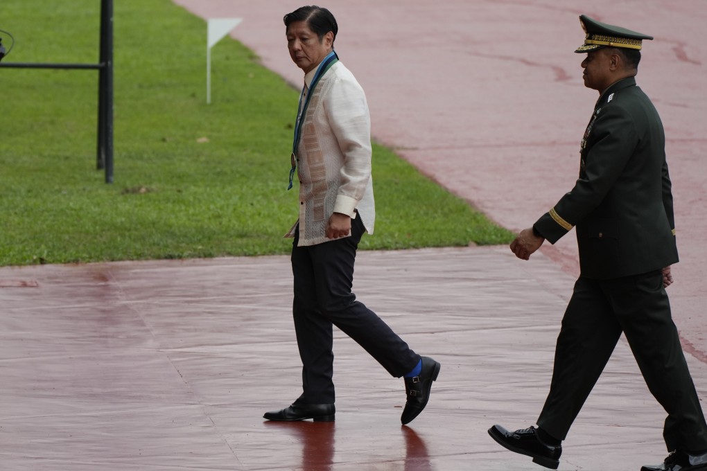 Philippine President Ferdinand Marcos Jnr is seen with military chief Romeo Brawner Jnr during the Armed Forces of the Philippines’ 89th anniversary in Quezon City, on December, 20, 2024. Photo: AP