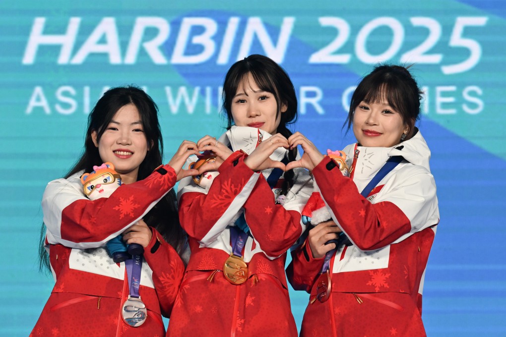 (From left) Han Linshan, Liu Mengting and Yang Ruyi again gave China a clean sweep in the big air. Photo: Xinhua