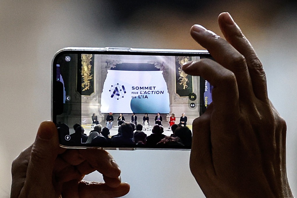 A participant takes a photo during a plenary session of the Artificial Intelligence (AI) Action Summit at the Grand Palais in Paris, France, on February 11.  Photo: EPA-EFE