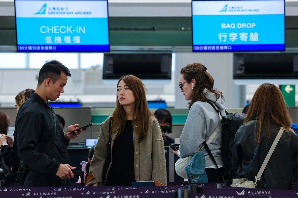 Passengers queue at a Greater Bay Airlines counter at Hong Kong International Airport. The report also acknowledged the heavy strain the incident had placed on the airline’s customer service capabilities Photo: Jelly Tse