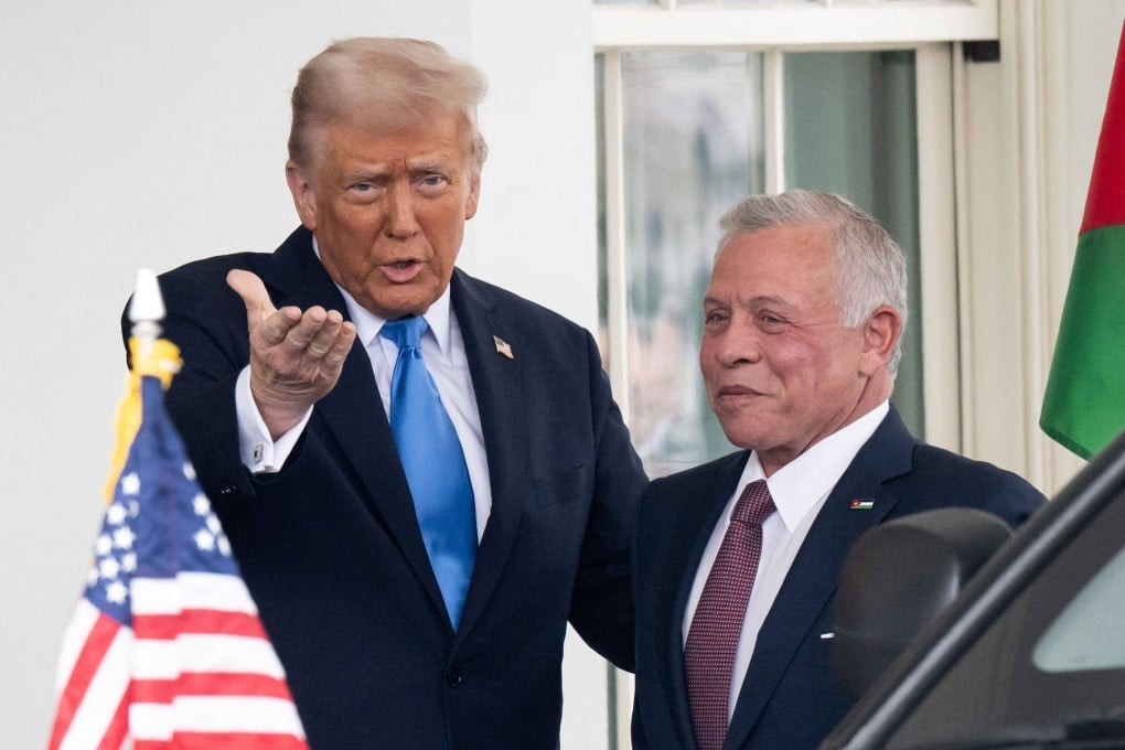 US President Donald Trump greets Jordan’s King Abdullah as he arrives for a meeting at the White House on Tuesday. Photo: AFP