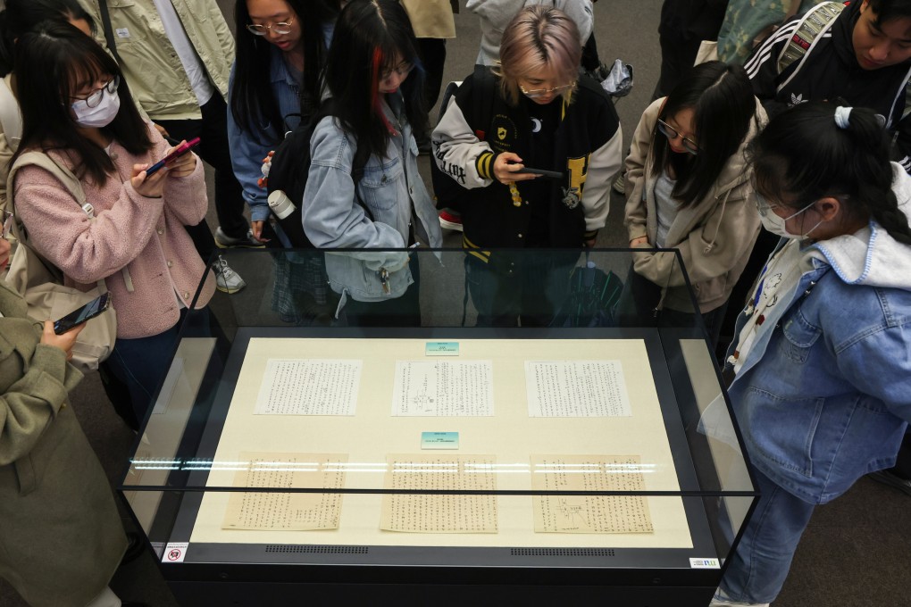 Hong Kong Metropolitan University students take a look at some of Eileen Chang’s manuscripts. Photo: Jelly Tse
