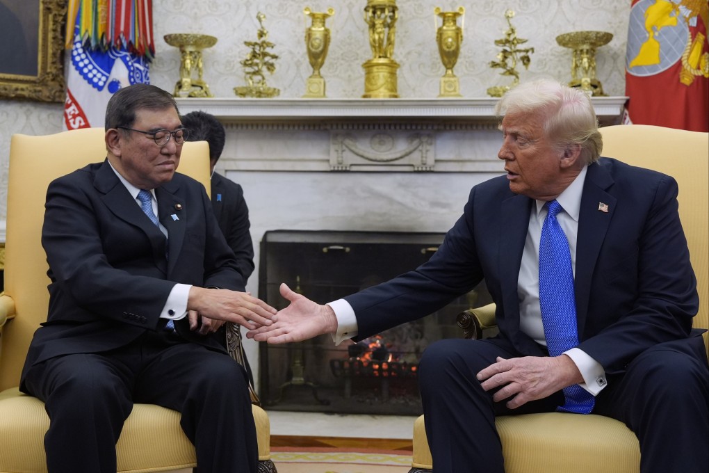 Donald Trump greets Shigeru Ishiba in the Oval Office of the White House on Friday. Photo: AP