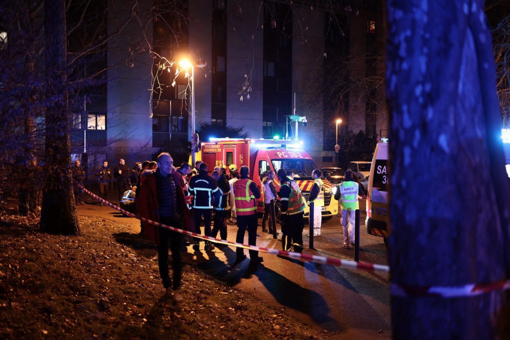 Emergency services work near the scene of an explosion at a bar where a grenade was thrown, in Grenoble, on February 12, 2025. Photo: AFP