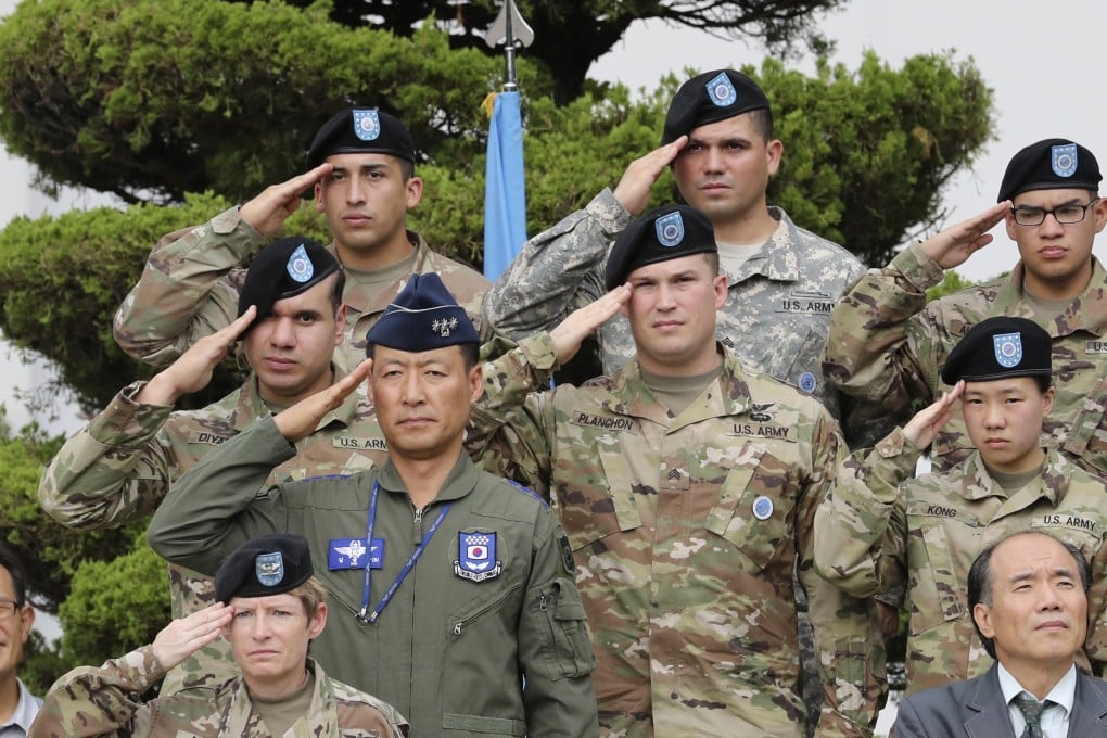 American and South Korean soldiers salute during a change of command and change of responsibility ceremony at a US military base, in Seoul, South Korea, in 2017. Photo: AP