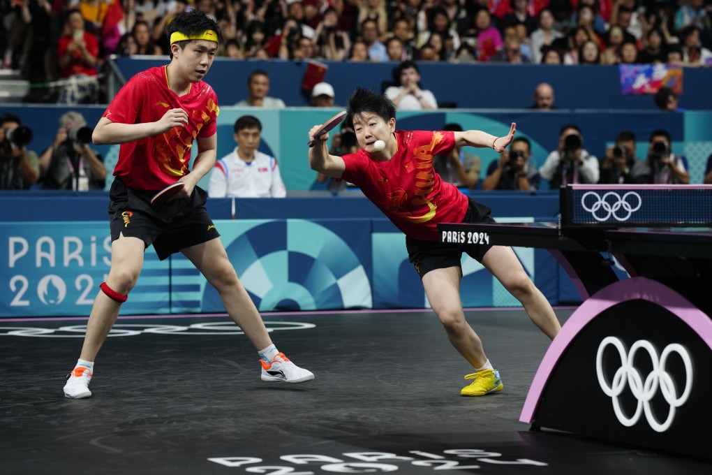 China’s Wang Chuqin (left) and Sun Yingsha in action at the Paris Olympics. Photo: AP
