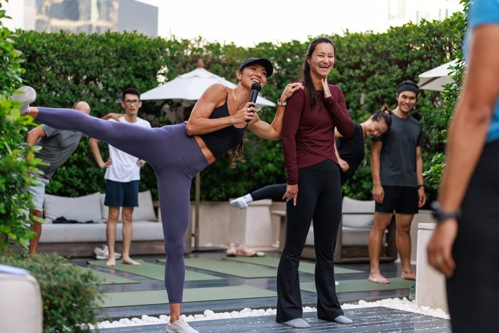 Move Inwards co-founders Steph Cuvelier (leg raised) and Camille Cheng (centre), who will lead a yoga flow session as part of a Saturday afternoon event co-hosted by Girls Lift Girls at The Lawn @ The Upper House, Admiralty, Hong Kong.
Photo: instagram.com/moveinwards