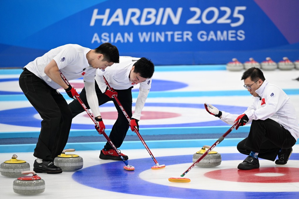 Jason Chang (right), Martin Yan (left) and Chung Cheuk-hei of Hong Kong in action at the Games in Harbin. Photo: Xinhua
