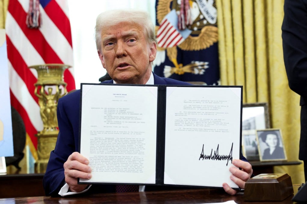 US President Donald Trump holds an executive order about tariffs increase. Photo: Reuters