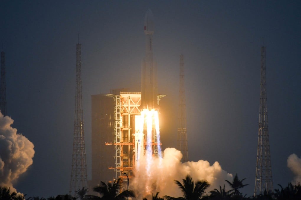 A Long March 8A rocket, carrying a group of low-Earth orbit satellites, launches from the Wenchang Space Launch Center in Hainan province on Tuesday. Photo: CNSPhoto via Reuters