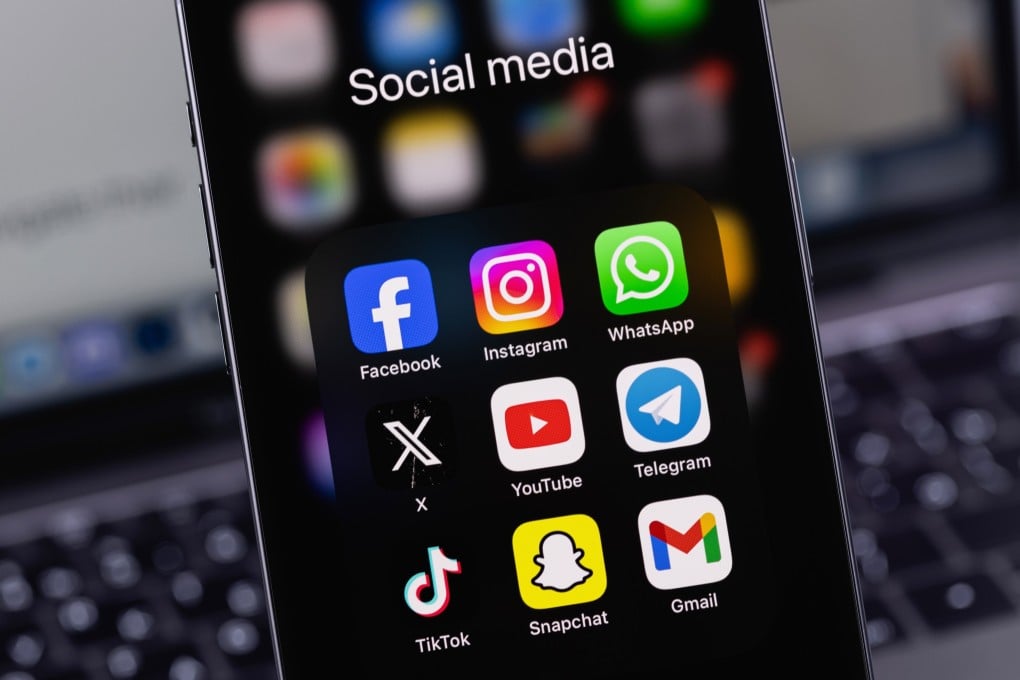 A smartphone showing social media apps including Facebook, Instagram, X, TikTok and Snapchat. Photo: Shutterstock