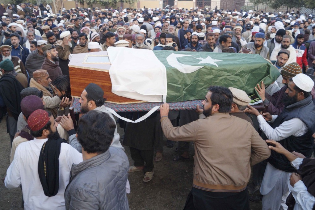 Relatives and local residents attend the funeral of a police officer who was killed by suspected militants in Dera Ismail Khan, Pakistan, on January 15 2025. Photo: EPA-EFE