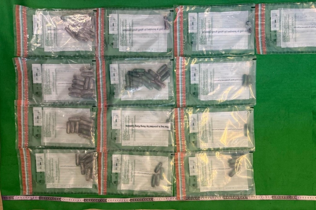 The suspects have so fat expelled 68 pellets containing about 900 grams of suspected cocaine. Photo: Handout