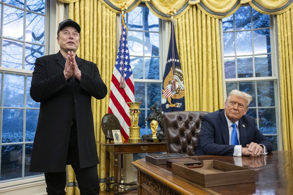 Elon Musk speaks as US President Donald Trump looks on in the Oval Office on Tuesday. Photo: TNS