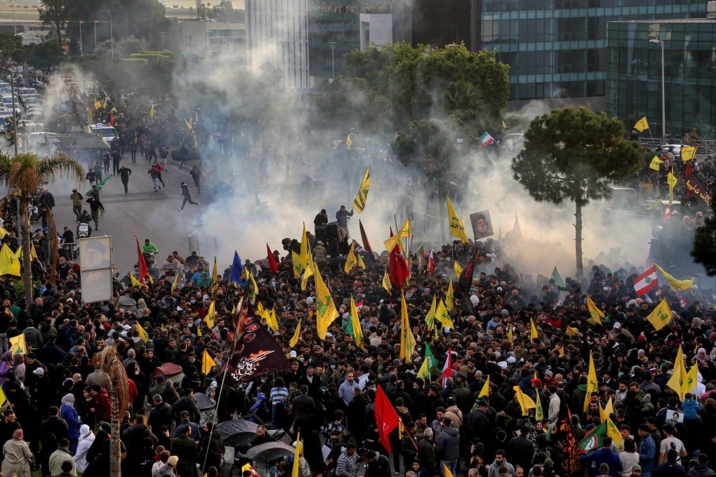 Tear gas fumes rise during clashes between Hezbollah supporters and the Lebanese Army at a Hezbollah-organized rally blocking the road to Beirut International Airport, on Saturday. Photo: dpa