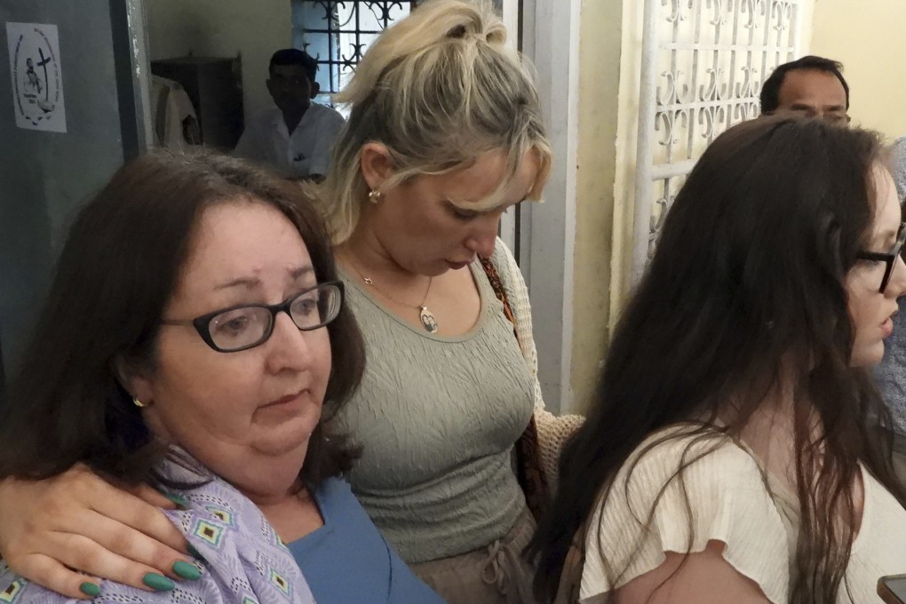 Danielle McLaughlin’s family members react after the court’s verdict on the case in Goa, India, on Friday. Photo: AP