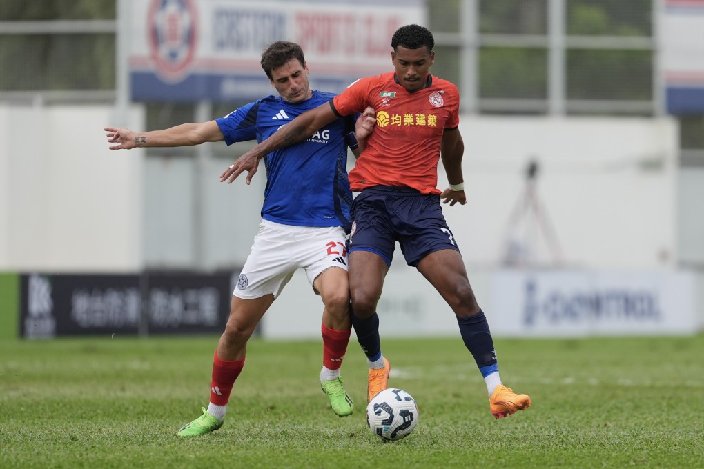 North District forward Matheus Chulapa fends off Marcos Gondra during a 2-1 loss to Eastern earlier this season. Photo: Eugene Lee