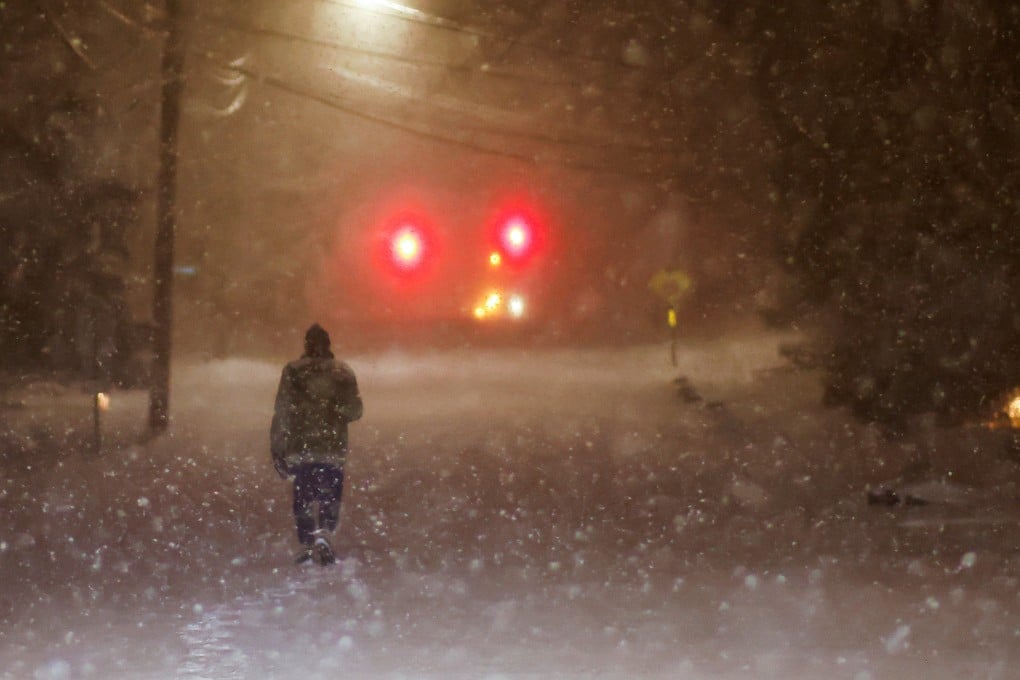 A man walks along an empty road during the pass of a polar vortex in Norwood, New Jersey, on January 19, 2025. Photo: Reuters