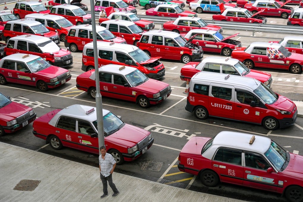 Taxis in the queue to pick up passengers outside Hong Kong International Airport in Chek Lap Kok. Photo: Eugene Lee
