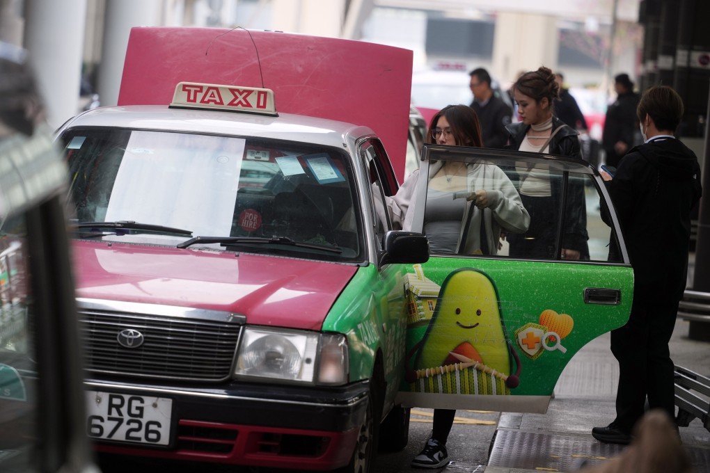 Hong Kong taxi drivers have urged authorities to crack down on illegal ride-hailing services. Photo: Sun Yeung