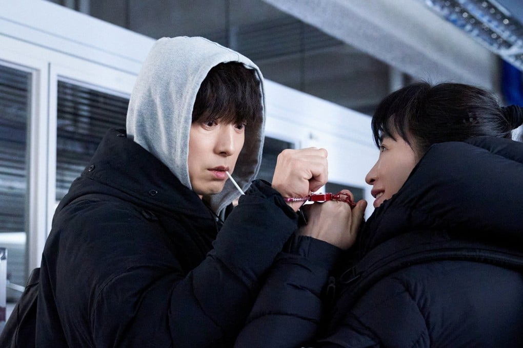 Jung Sung-il (left) and Kim Hye-soo in a still from the Disney+ thriller series Unmasked.