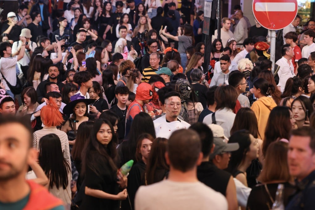 Halloween revellers pack Hong Kong’s party zone, Lan Kwai Fong, on October 26. Photo: Nora Tam