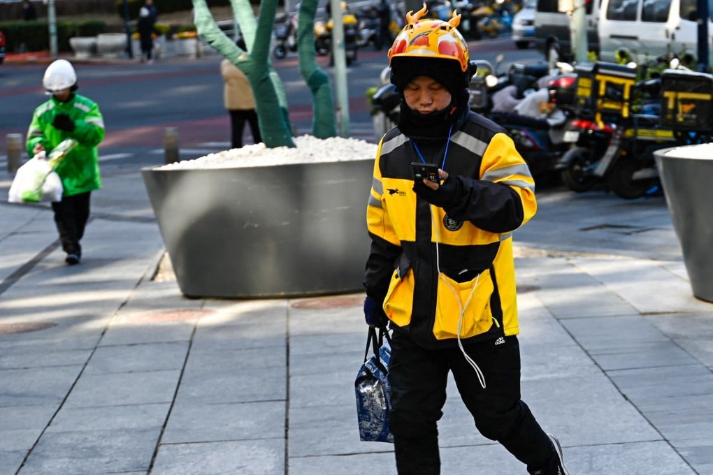 Welfare benefits will be enhanced for millions of food-delivery workers across China. Photo: AFP