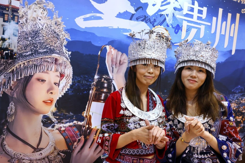 People wear ethnic outfits at the Hong Kong Holiday and Travel Expo. Photo: Dickson Lee