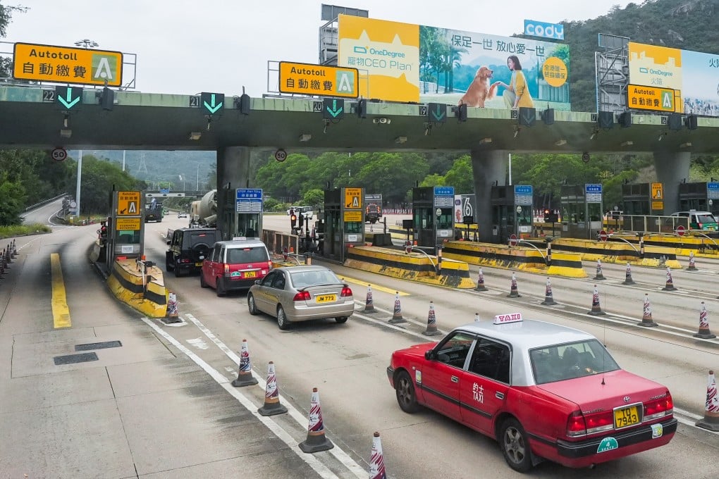 Motorists wait at a toll plaza before entering Tai Lam Tunnel. Photo: Eugene Lee