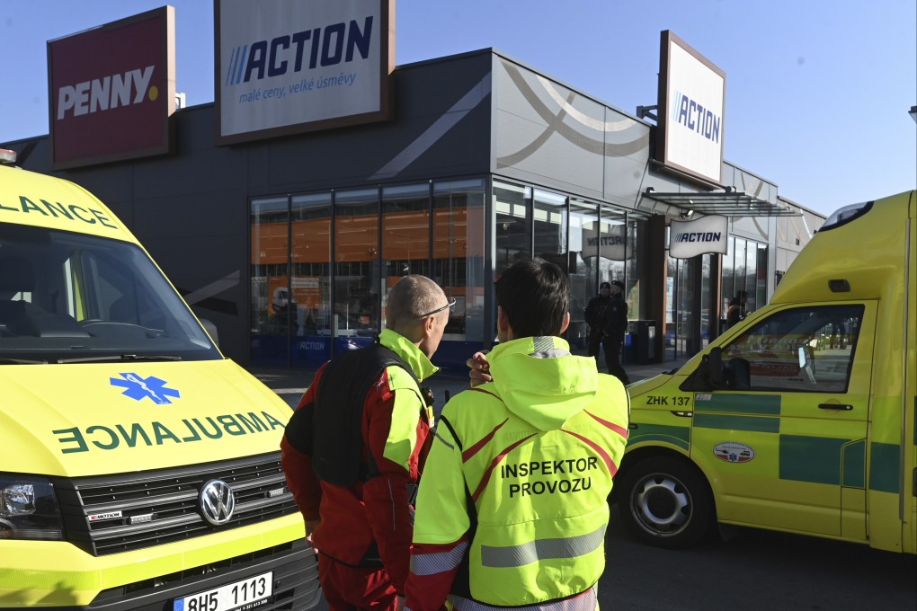 Police and ambulances at a a shopping area in Hradec Kralove, Czech Republic, where two women died after a knife attack on February 20, 2025. Photo: AP