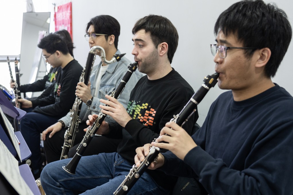 Spanish clarinettist Miguel Peñarroja Canós (second from right) rehearses with fellow musicians taking part in the Youth Music Culture The Greater Bay Area training camp and festival in preparation for the 2025 YMCG concerts in Guangzhou, Shenzhen and Hong Kong. Photo: Youth Music Culture The Greater Bay Area