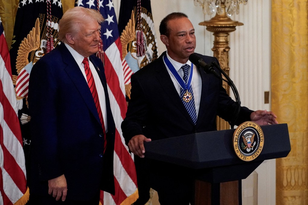 Donald Trump (left) and Tiger Woods discussed a solution to end the split in golf. Photo: Reuters