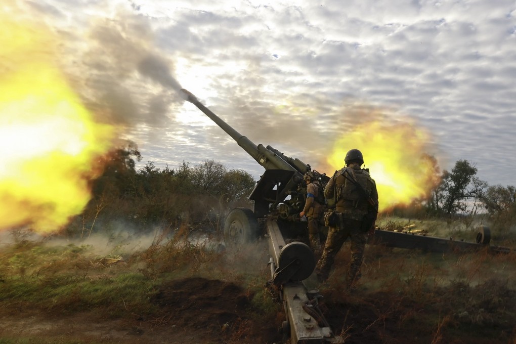 Ukrainian servicemen fire a captured Russian howitzer in 2022. The war reaches its third anniversary on Monday. Photo: EPA-EFE