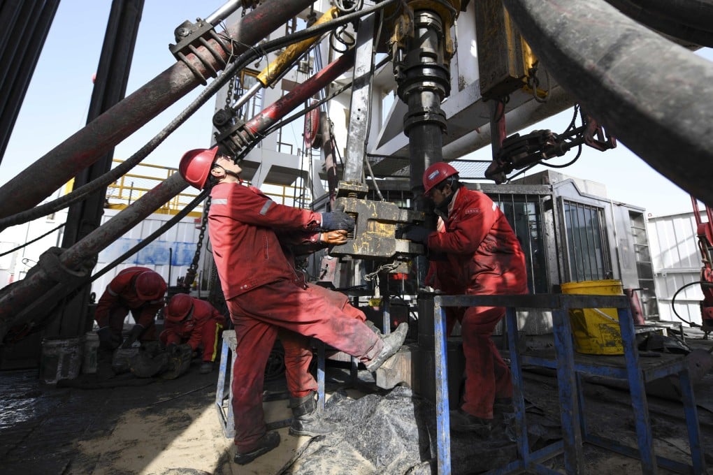 Workers at the Shenditake 1 ultra-deep well site in Xinjiang’s Tarim Basin on Wednesday. Photo: Xinhua