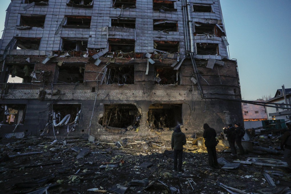 People look at the site of a Russian missile strike in Kyiv on February 12. Photo: EPA-EFE