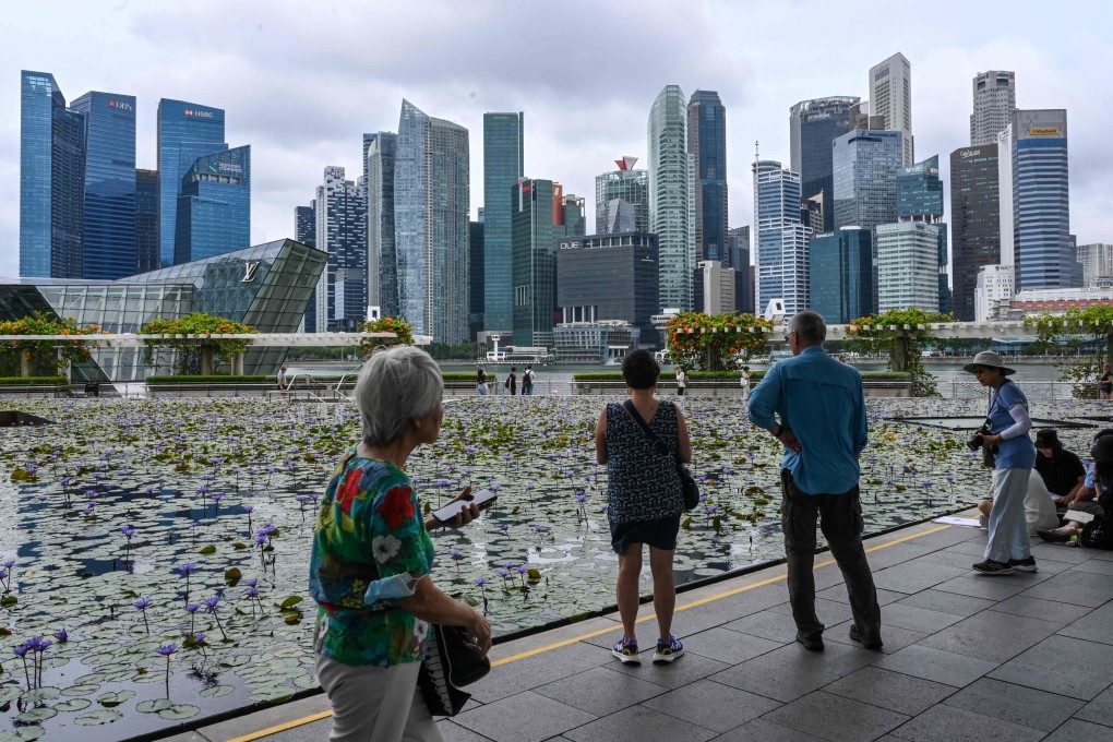 Most Singaporeans feel the latest budget falls short amid rising living costs, according to a poll. Photo: AFP